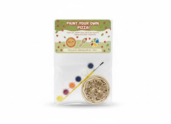 Personalised paint your own pizza party bag with wooden pizza disc, 6 paint pots and brush in a clear bag with custom label on white background
